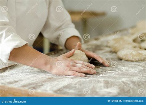 Kneading Yeast-free Raw Dough in the Hands of a Baker Stock Image ...