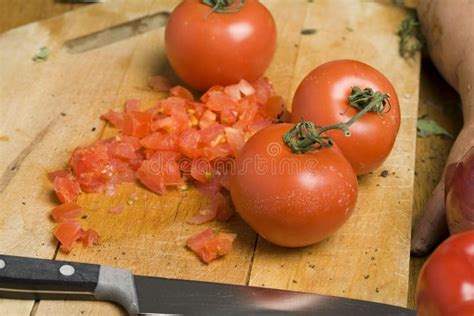 Chopped tomatoes stock image. Image of knife, eating, flavour - 1949955