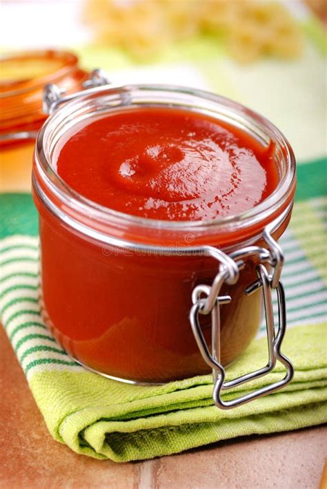 Tomato sauce in glass jar stock image. Image of ingredient - 44742911