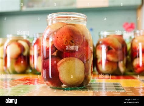 Jars of homemade fruit preserves - vintage photo Stock Photo - Alamy