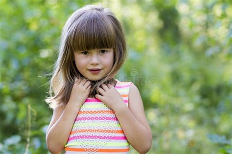 Portrait of Beautiful Little Girl with Dark Hair Outside Stock Image ...