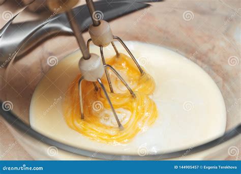 Mixing the Ingredients of Biscuit Dough with an Electric Mixer Stock ...