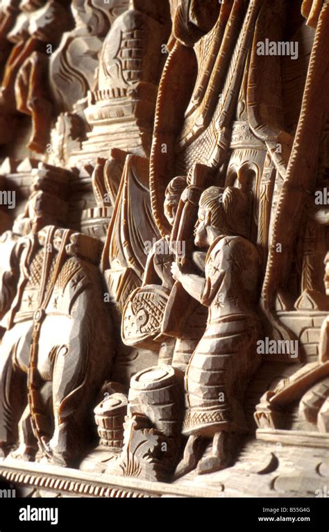 wood carving vientiane laos Stock Photo - Alamy