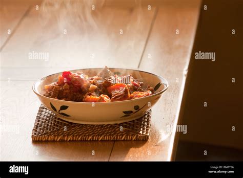 A plate of steaming hot food Stock Photo - Alamy