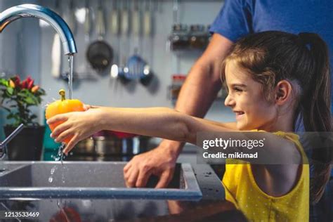 Washing Vegetables Family Photos and Premium High Res Pictures - Getty ...