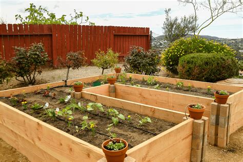 How to build a simple, durable raised garden bed with natural materials?