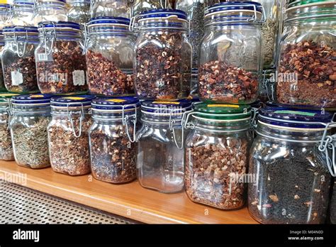 Jars dried herbs on shelves hi-res stock photography and images - Alamy