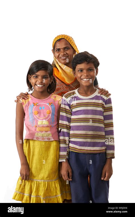 Rural family standing together and smiling Stock Photo - Alamy