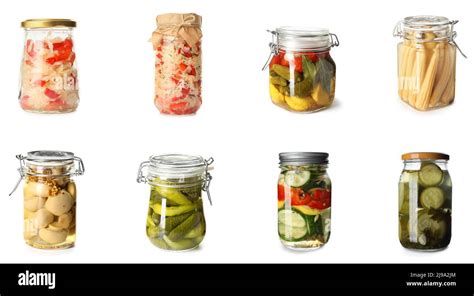 Set of jars with canned vegetables on white background Stock Photo - Alamy