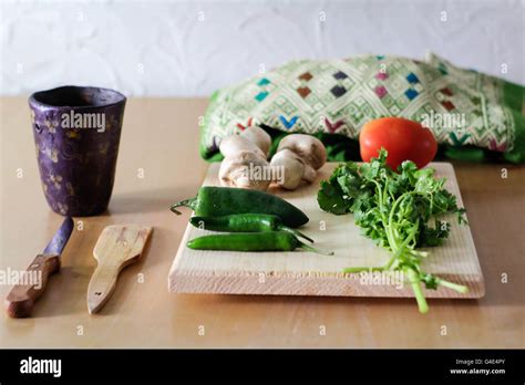 Photograph of some food ingredients on a cutting board Stock Photo - Alamy