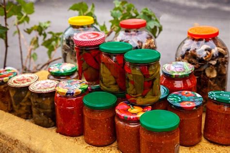 Premium Photo | Preserves vegetables in glass jars jars of pickled ...