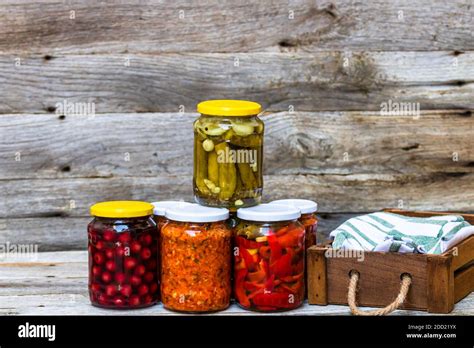 Jars with variety of canned vegetables and fruits, jars with zacusca ...