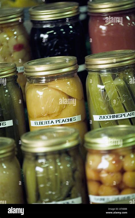 The life of stacks of mason jars with home canned fruits and vegetables ...