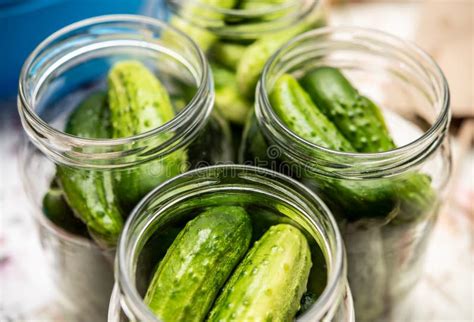 Homemade Pickled Cucumbers in Glass Jars - Traditional Salting Process ...