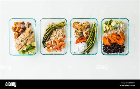 Meal prep containers filled with healthy lunches Stock Photo - Alamy