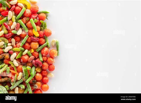 Frozen vegetables on a white background with copy space. Frozen ...