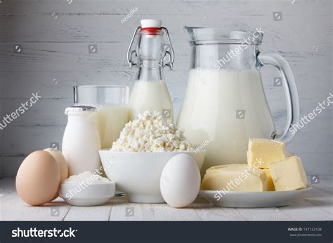 Dairy Products On Wooden Table Stock Photo 147122108 | Shutterstock