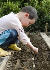 Children Planting Seeds