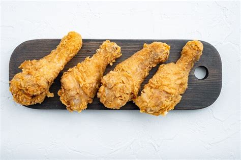 Premium Photo | Crispy fried chicken cuts on white background
