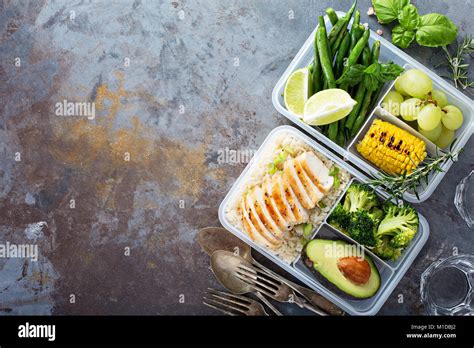 Healthy green meal prep containers with rice and vegetables Stock Photo ...