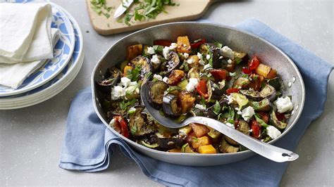 Roasted vegetables with herbs and feta recipe - BBC Food