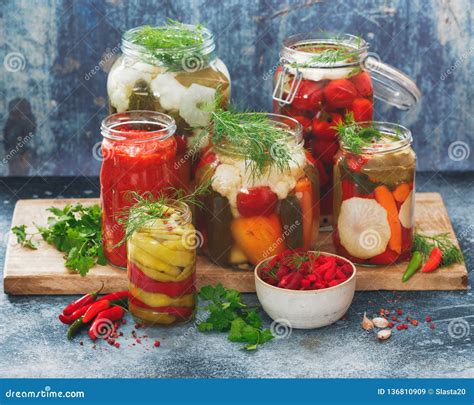 Homemade Preserves and Pickles of Different Vegetables in Jars Stock ...