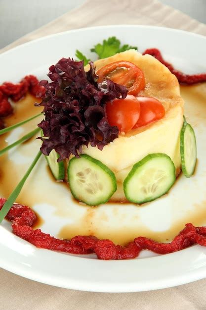 Premium Photo | Small portion of food on big plate close up