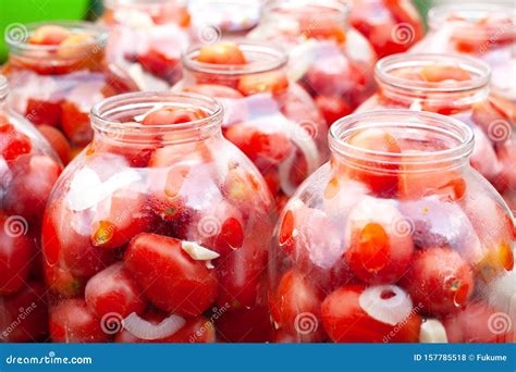 Pickled Canned Tomatoes In Jars.tomato-filled Cans Stock Photography ...