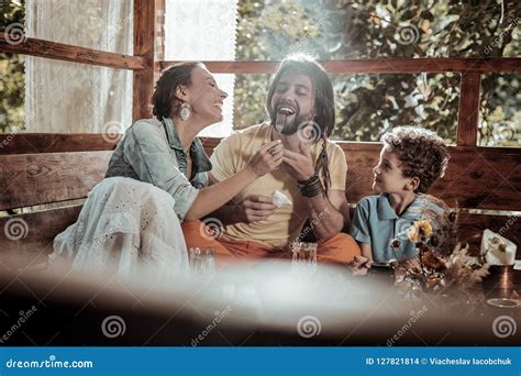 Cheerful Family Enjoying Their Food in Garden House Stock Photo - Image ...