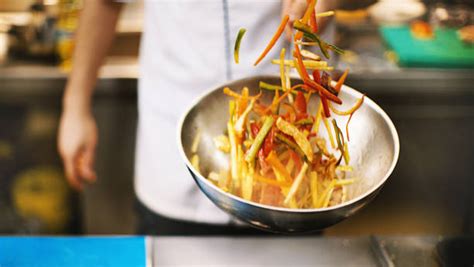 Tossing Vegetables Stock Photos, Pictures &amp; Royalty-Free Images - iStock