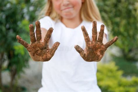 The Child Shows His Hands in the Dirt Stock Photo - Image of happiness ...