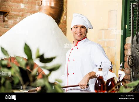 chef working in the kitchen Stock Photo - Alamy