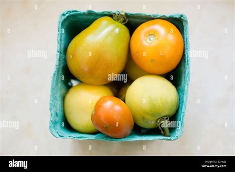 ripe heirloom tomatoes Stock Photo - Alamy