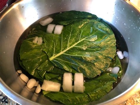 Ice Bath For Blanched Collard Greens In A Large Metal Bowl Stock Photo ...