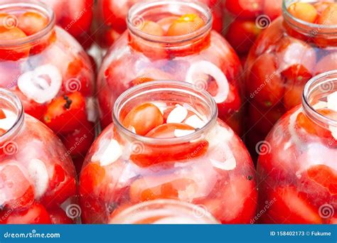 Pickled Canned Tomatoes In Jars.tomato-filled Cans Stock Photography ...