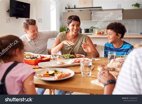 138,060 Family Eating Dinner Stock Photos, Images &amp; Photography ...