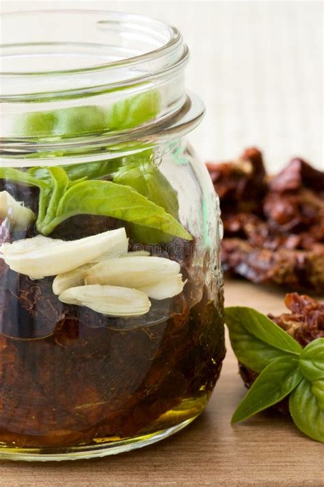 Preserved Tomatoes stock photo. Image of glass, studio - 15701066