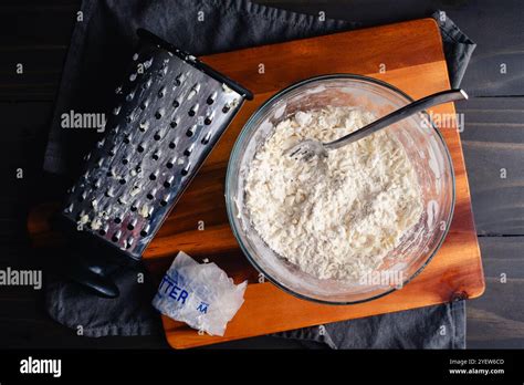 Grated Butter Mixed into Dry Ingredients for Pie Crust: Frozen butter ...