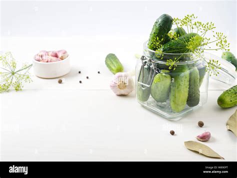 Fresh cucumbers for pickling with dill,garlic and spices.Selective ...