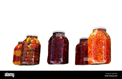 Jars preserved vegetables. Canned food in glass jars. Grocery conserve ...