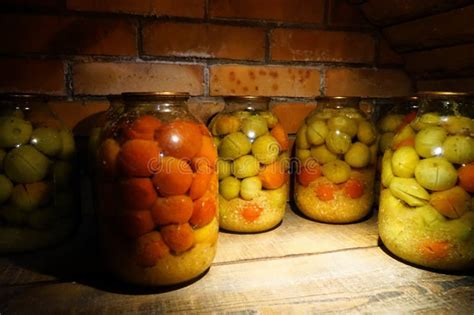 Glass Jars of Canned Tomatoes in the Basement on the Shelf Stock Image ...