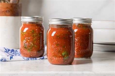 What are the safest methods for canning high-acid garden tomatoes at home?