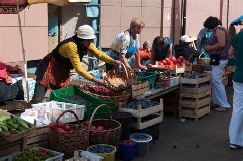 People Buying and Selling Vegetables in a Street Market in Kazan ...