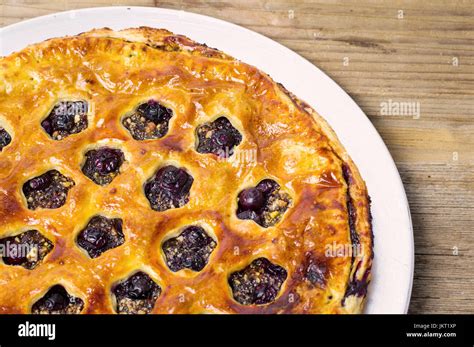 Homemade berry fruit sweet pie with golden crust Stock Photo - Alamy