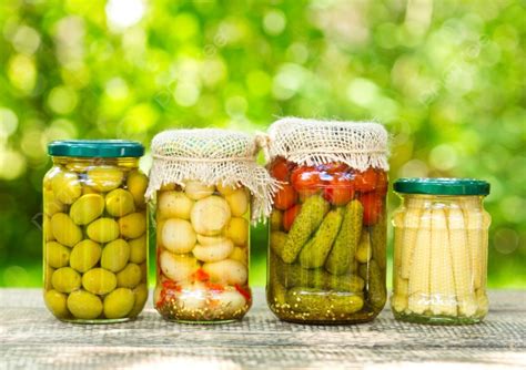 Preserved Vegetables On Wooden Table Photo Background And Picture For ...