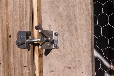 Wooden Door Metal Latch on Chicken Coop Stock Image - Image of latch ...