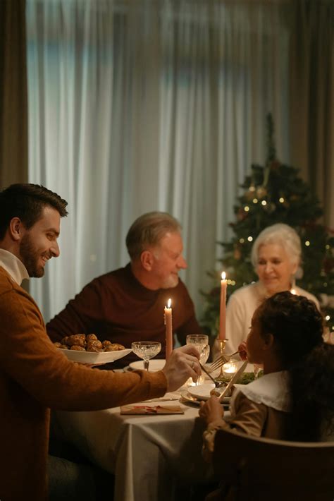 Happy Family Having a Dinner · Free Stock Photo