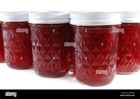 Multiple jars of homemade fruit jam Stock Photo - Alamy