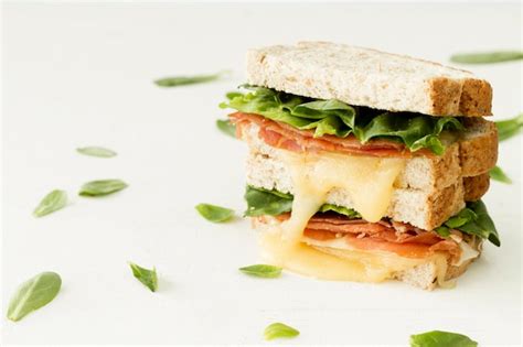 Free Photo | Fresh toast with cheese and vegetables on table