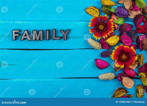 Family Word on Blue Wood with Flower Stock Photo - Image of concept ...